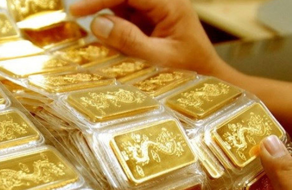 Giá vàng lên mức kỷ lục mới sau khi Fed giữ nguyên lãi suất